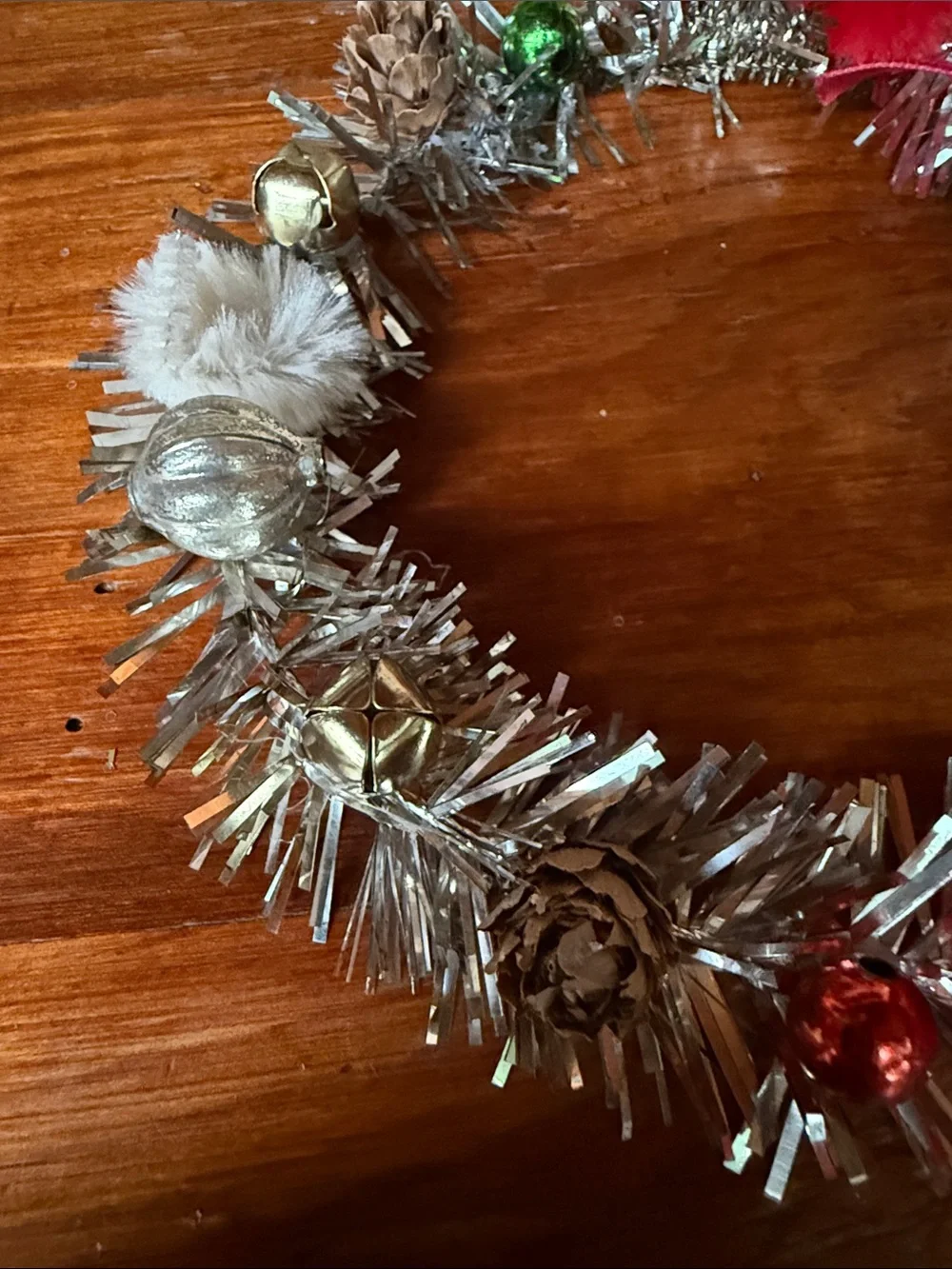🎄 6” Festive Silver Tinsel Holiday Wreath with Red Bow and Decorative Accents